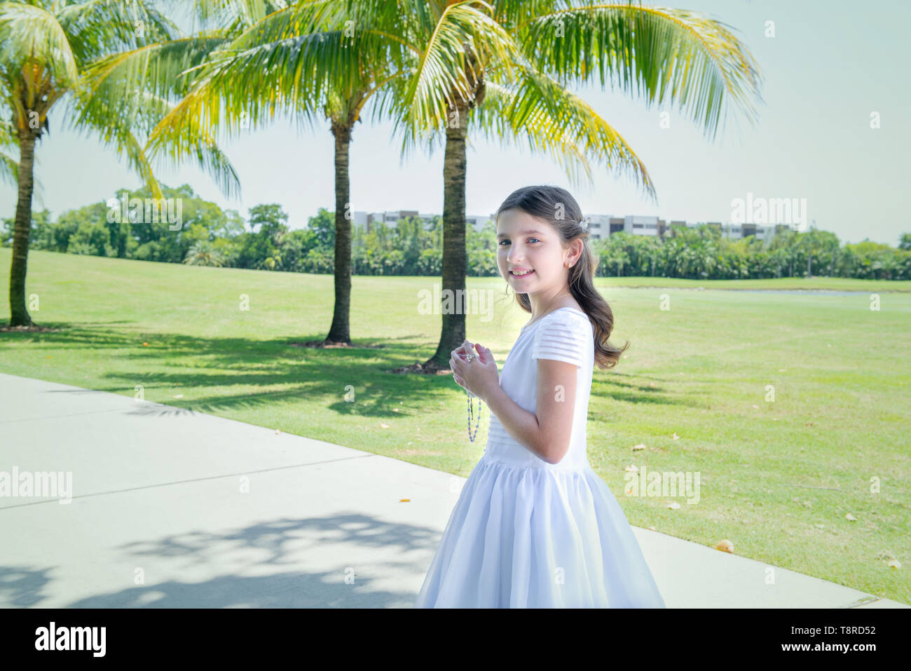 Pretty Girl in photo session for her first comunnion Stock Photo