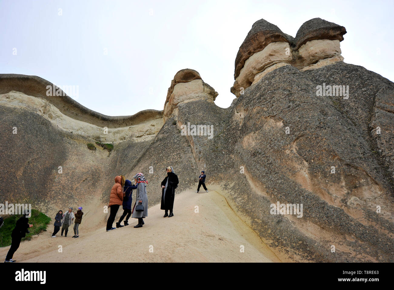 A group of young Muslim women visiting outdoor museum in Cappadocia, Turkey Stock Photo