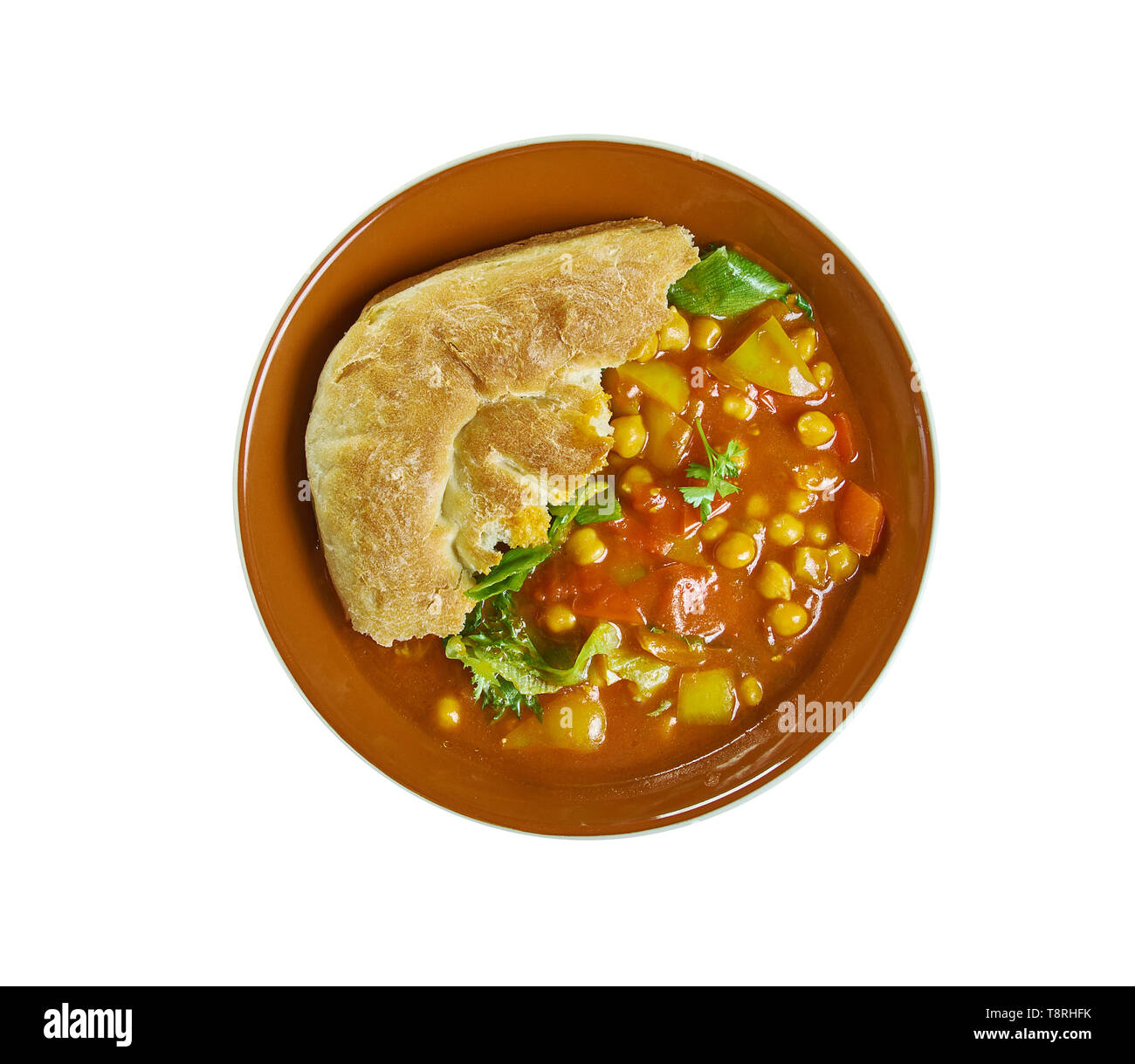 Chickpea, red pepper and spinach curry s flavoured with ginger, chilli