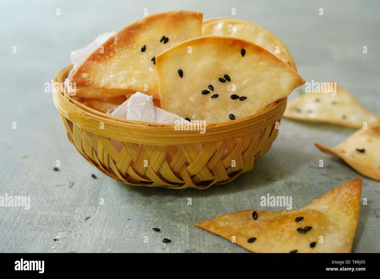 Homemade Wonton Crisps / Chips or Crackers, selective focus Stock Photo