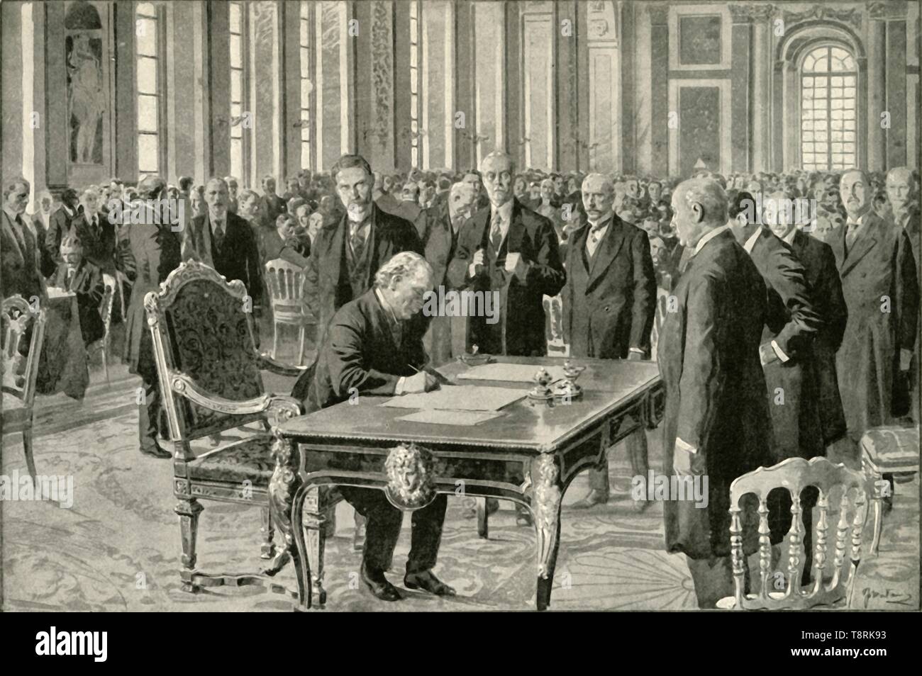 'The Prime Minister of Great Britain Signing the Peace Treaty', 1919. Creator: Unknown. Stock Photo