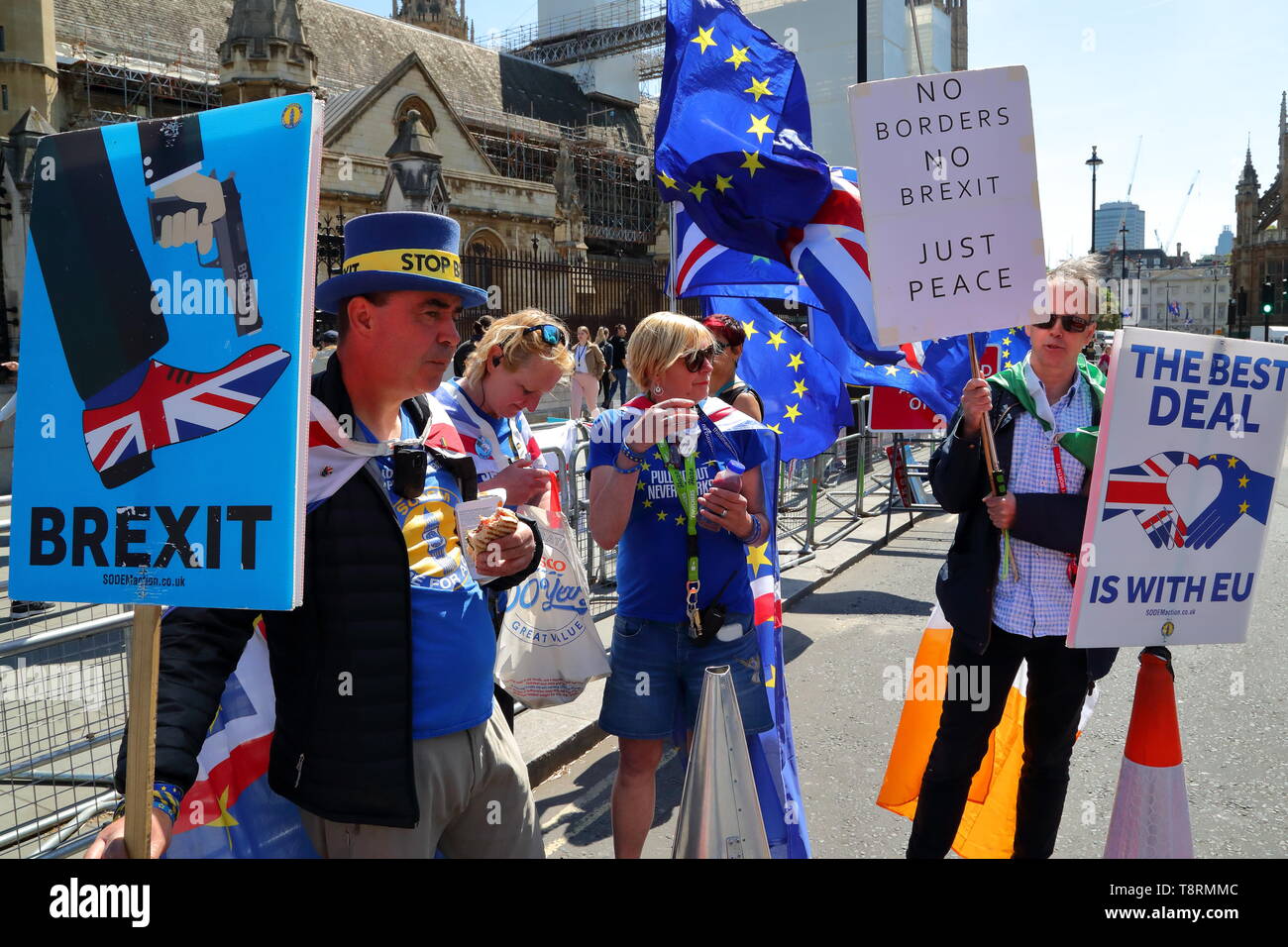 London, UK. 14th May 2019. Small groups of pro-EU and Brexit supporters demonstrate peacefully in front of the House of Parliaments in Westminster. Credit: Uwe Deffner / Alamy Live News Stock Photo