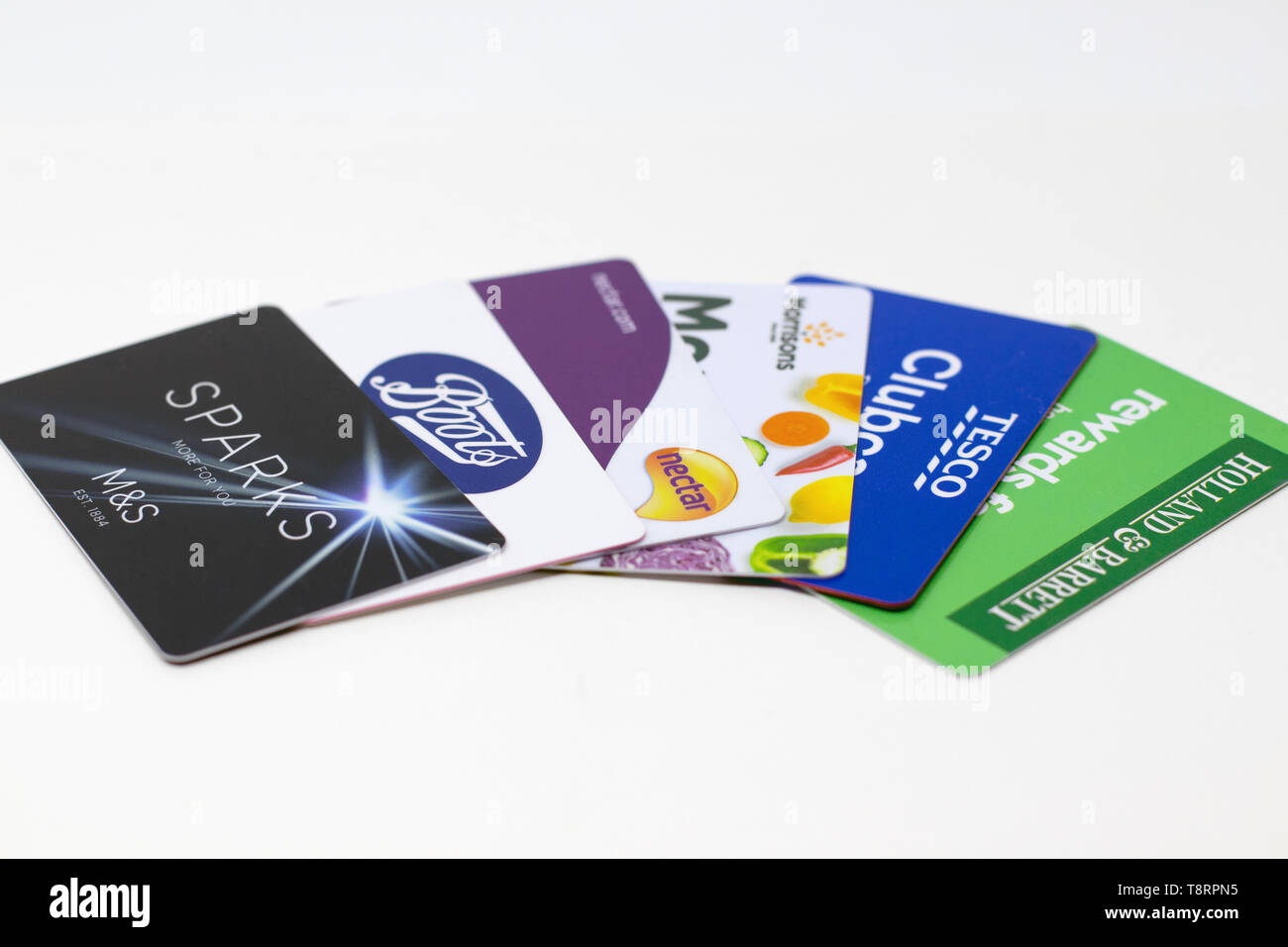 London, UK - 14th May 2019 - Collection of customer loyalty cards from Boots, Sainsbury's, Marks & Spencer, Holland & Barrett, Morrisons and Tesco sup Stock Photo