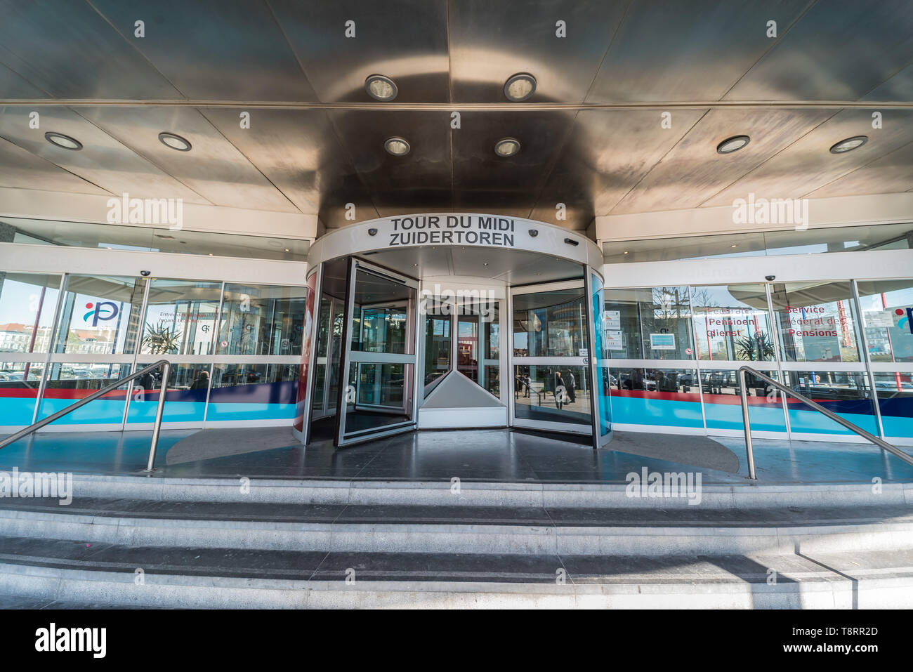 Brussels South / Belgium - 03 21 2018: Entrance door of the Brussels South Tour du Midi - Zuidertoren of the Belgian financial administration and pens Stock Photo