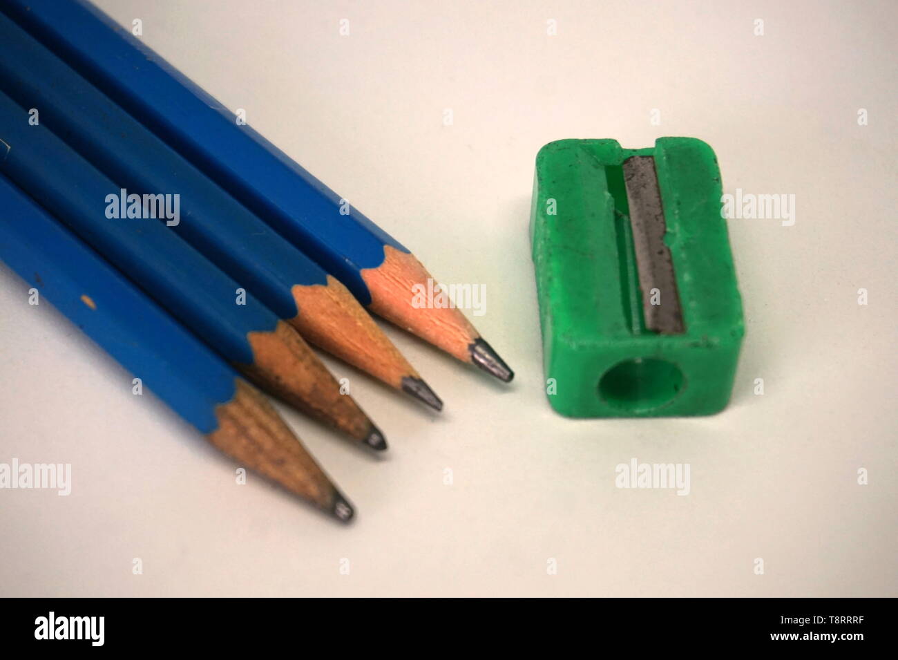 Pencils and a pencil sharpener Stock Photo