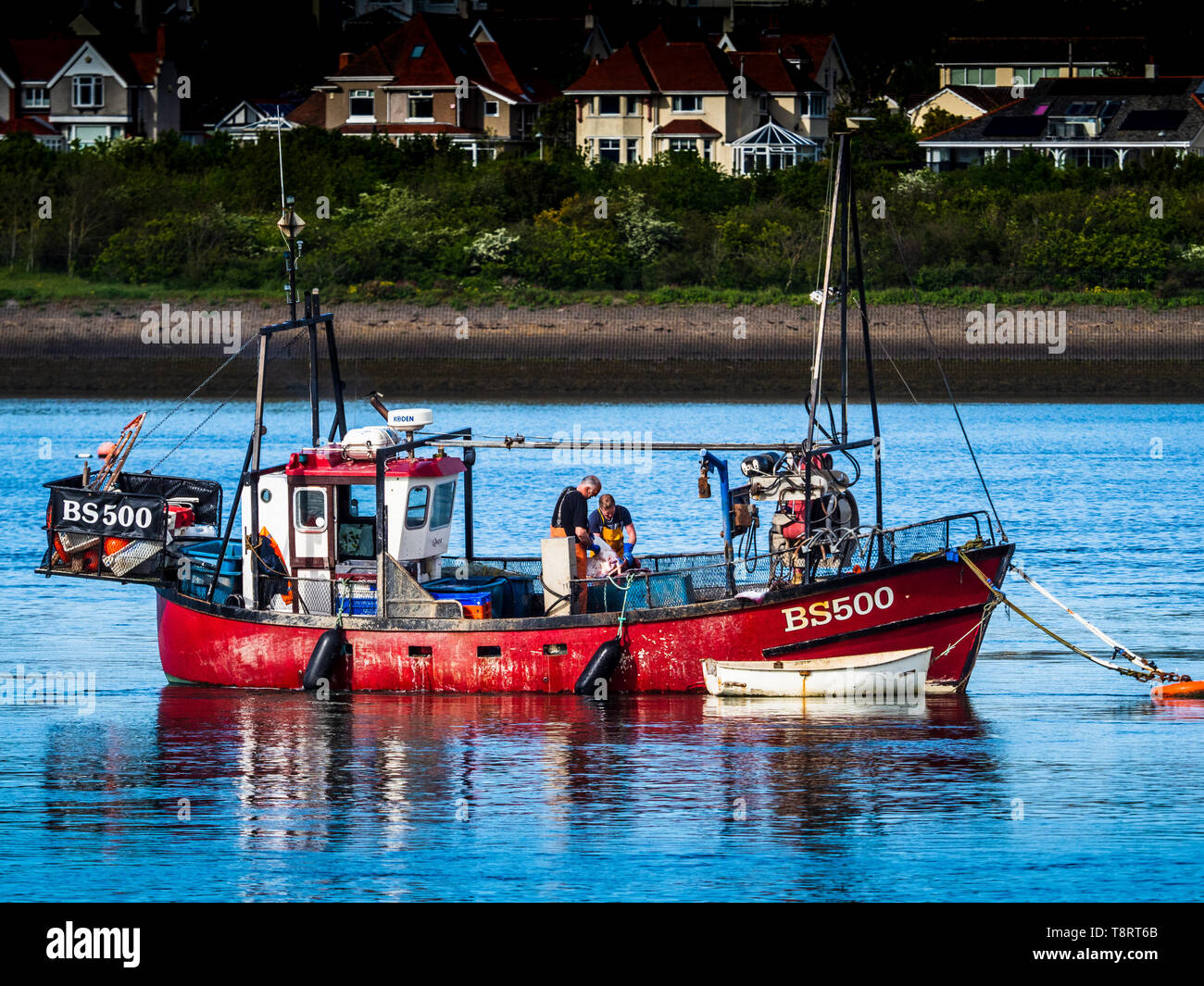 Welsh Fishermen sort out the days catch in Conwy, North Wales. Stock Photo