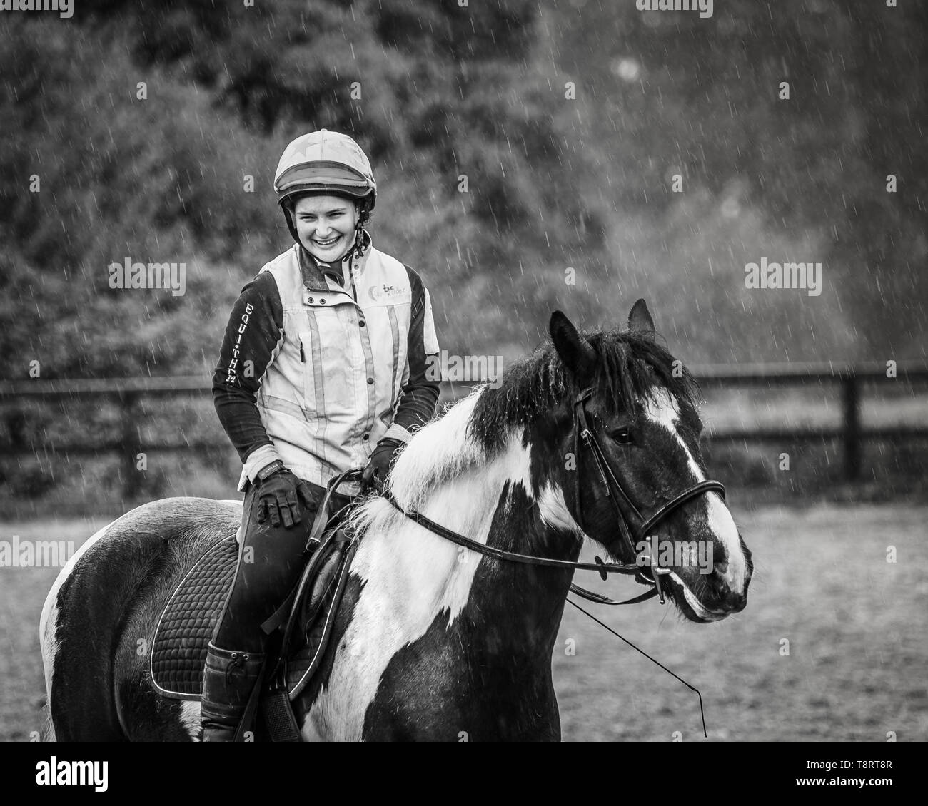 Woman getting wet in rain hires stock photography and images Alamy