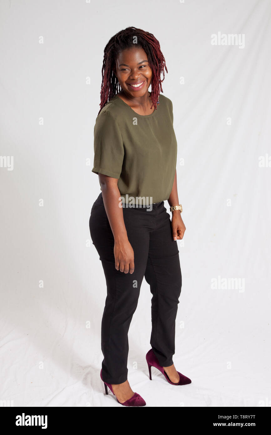 Happy black woman smiling hi-res stock photography and images - Alamy