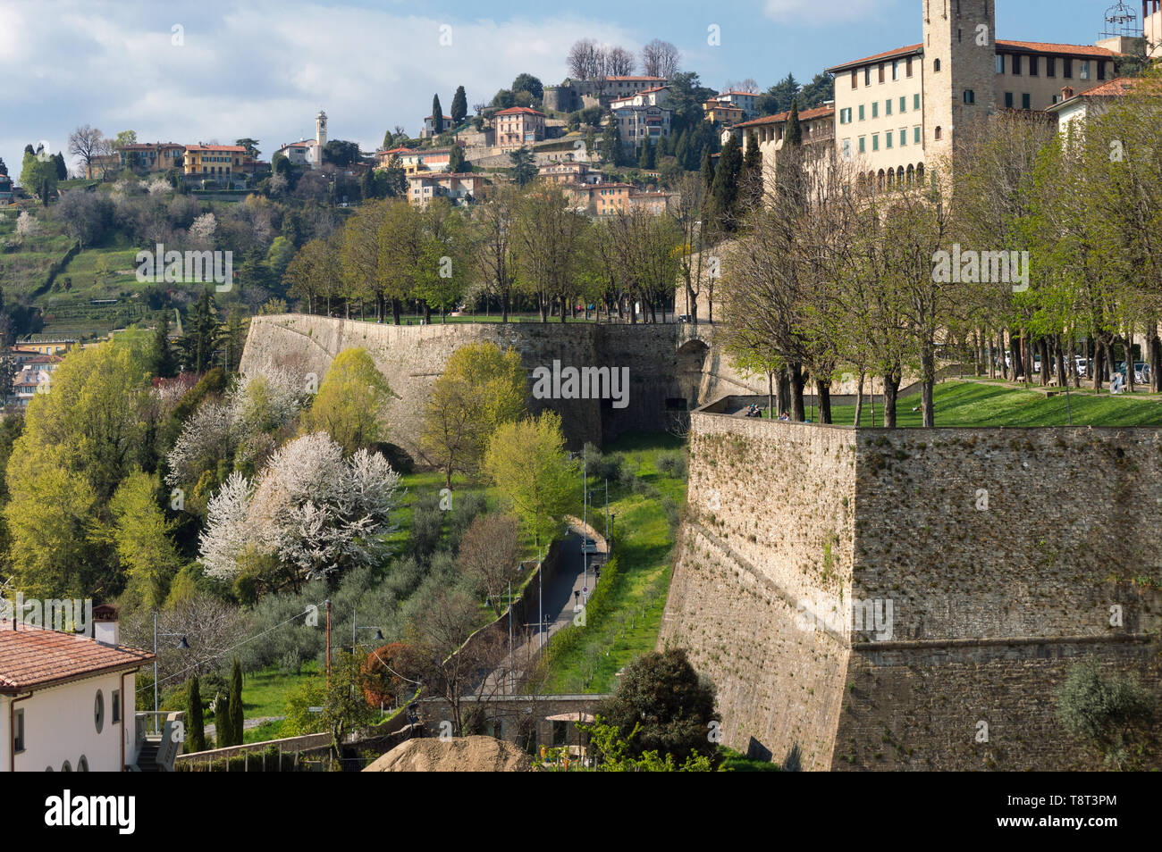 Detail of the ancient city walls of Bergamo the Upper town, these urban public places have been recently nominated Unesco heritage site Stock Photo