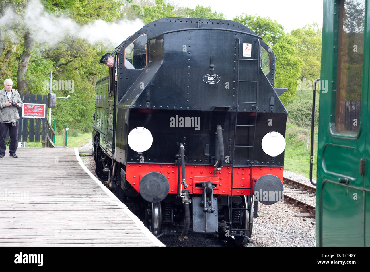 Locomotive 41313 on the Isle of Wight steam railway approaching ...