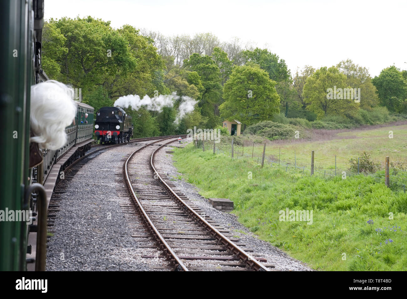 Locomotive 41313 on the Isle of Wight steam railway approaching ...