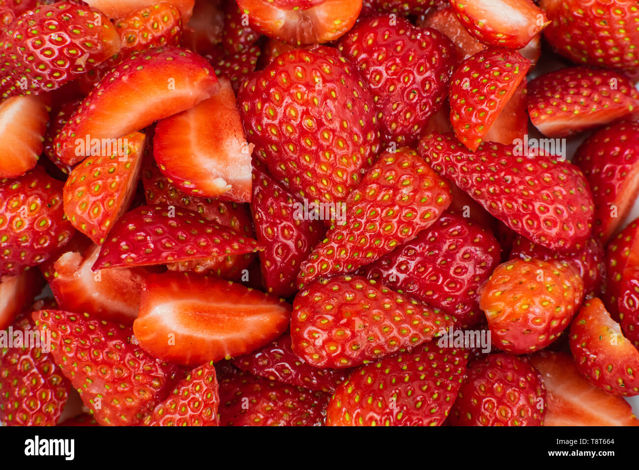 Ripe strawberry cut in half hi-res stock photography and images - Alamy