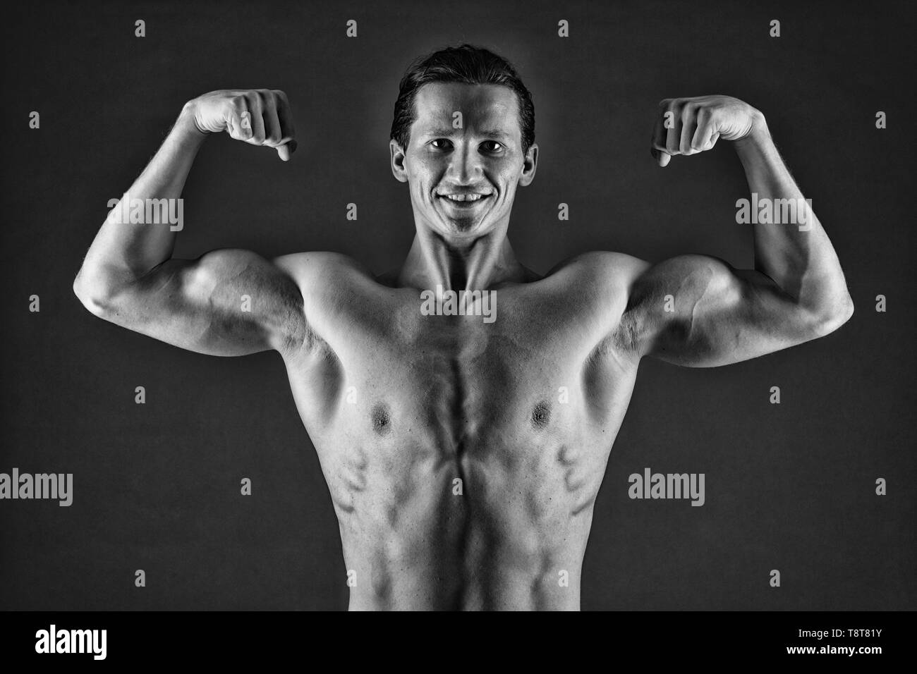 Strong Built Man Improve yourself. Man muscular athlete stand confidently. Attractive ...
