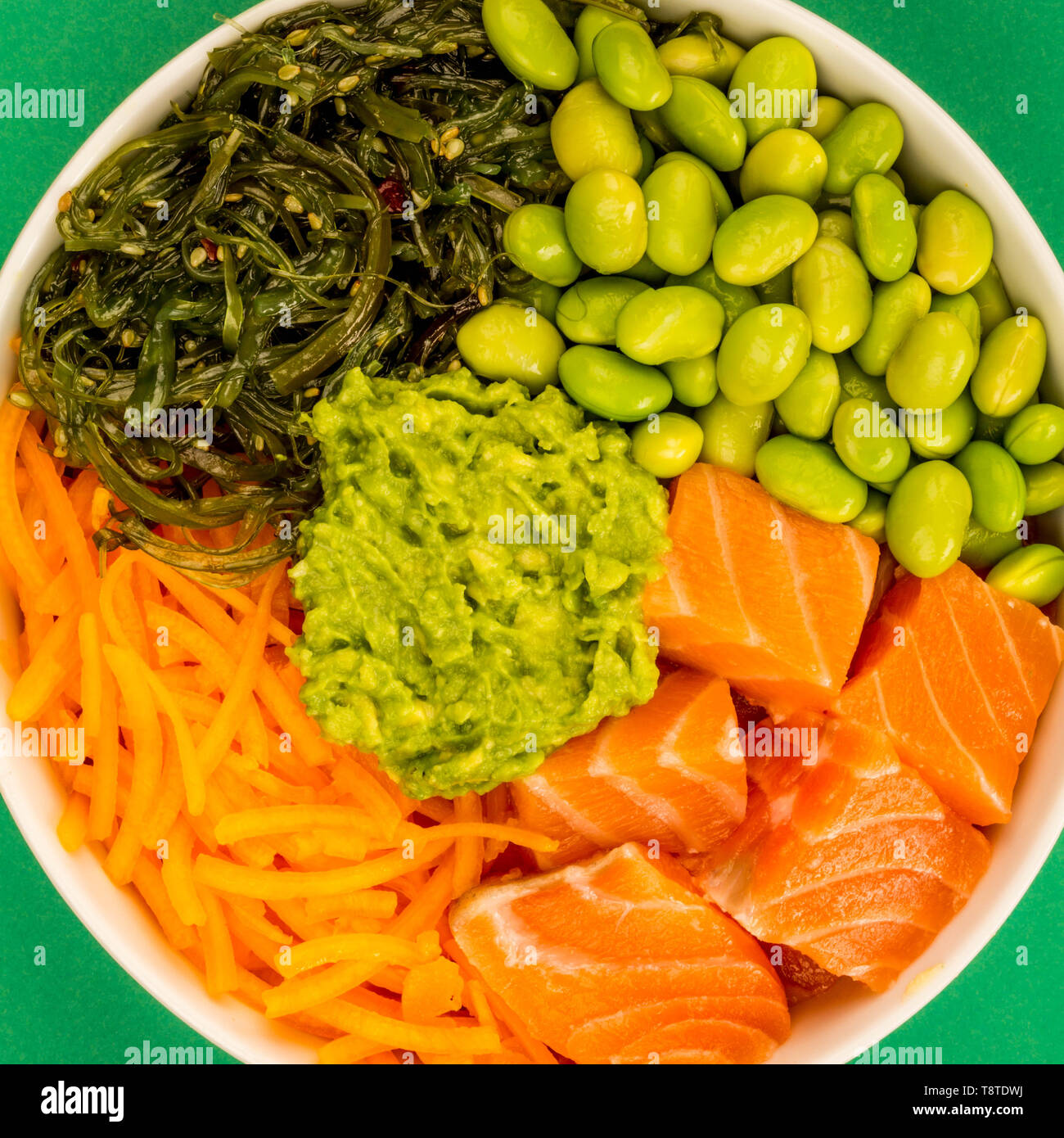 Fresh Raw Uncooked Slamon With Edamame Beans Carrots and Seaweed Stock