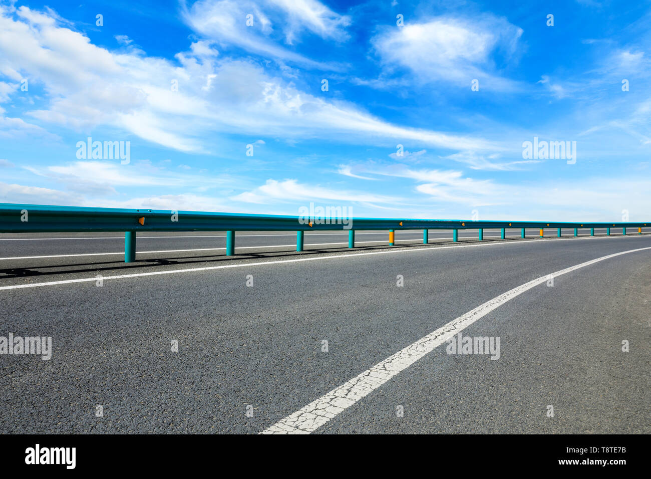 Empty asphalt road ground and blue sky with white clouds scene Stock ...