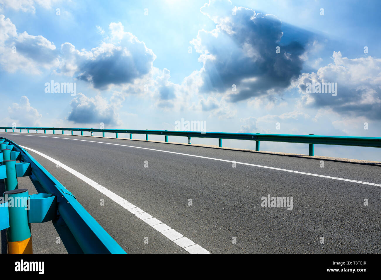 Empty asphalt road ground and blue sky with white clouds scene Stock ...