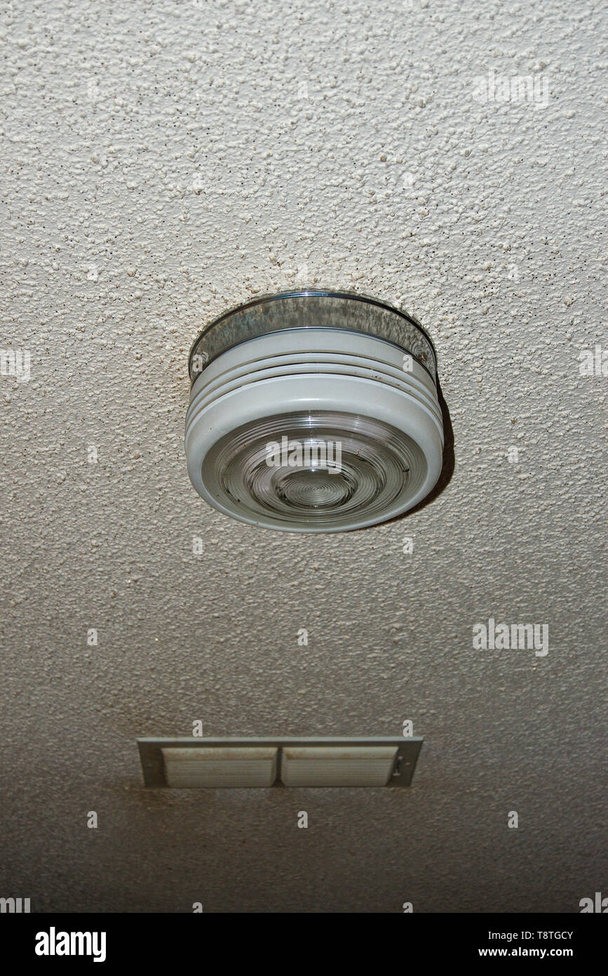 Old Ceiling Light With Sparkly Popcorn Texture Stock Photo