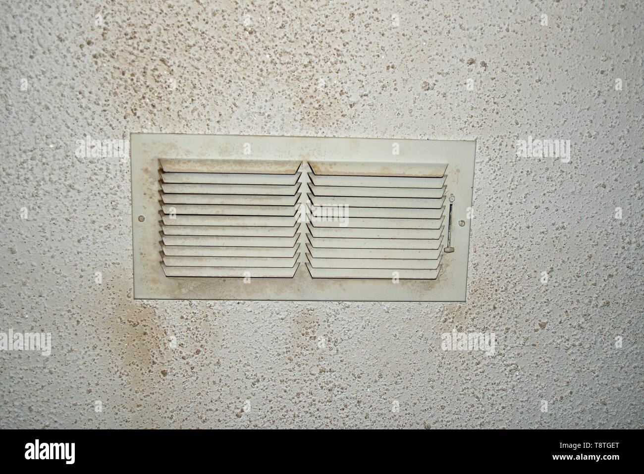 Old ceiling vent with sparkly popcorn texture Stock Photo - Alamy