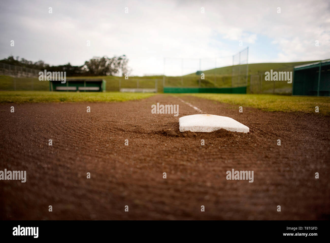 Base in the dirt of a baseball diamond. Stock Photo