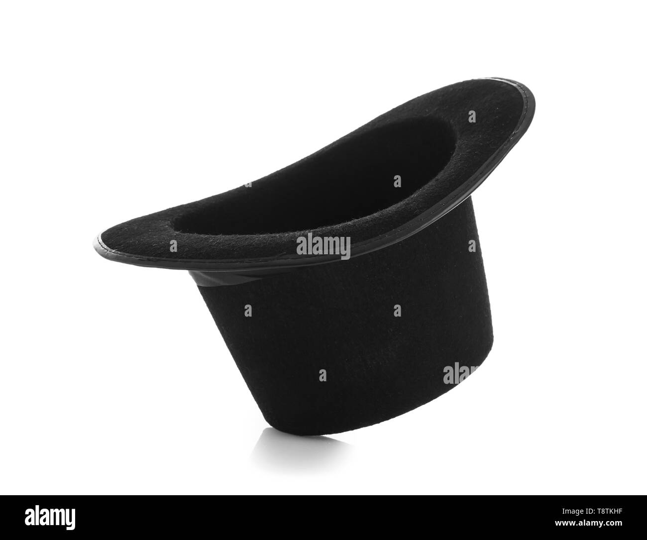 Black magician hat on white background Stock Photo - Alamy