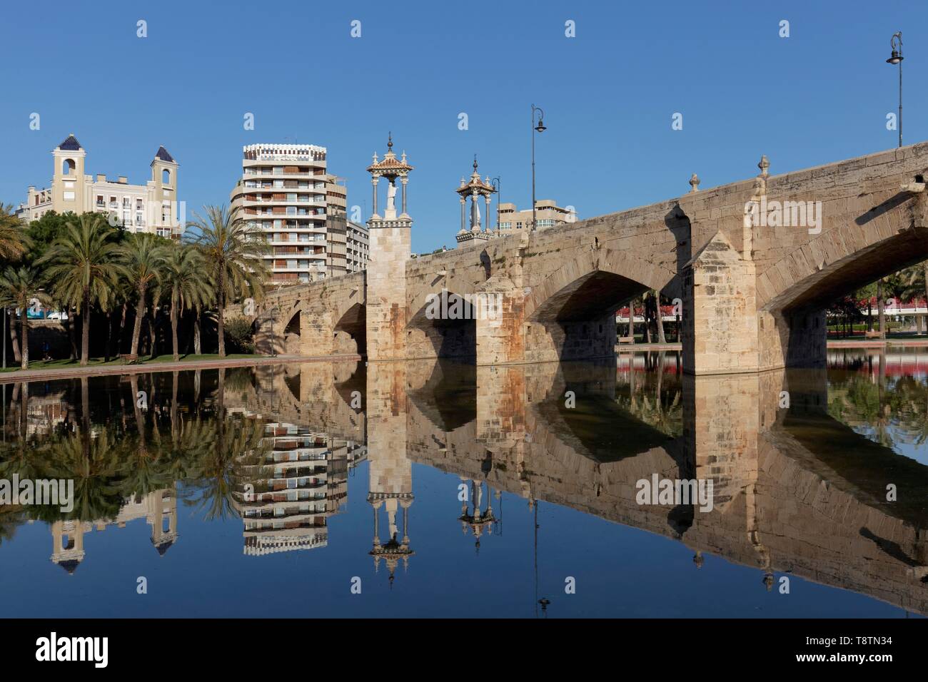 Historical bridge with statues of saints, Puente del Mar, Turia Park, Jardi del Turia, Valencia, Spain Stock Photo