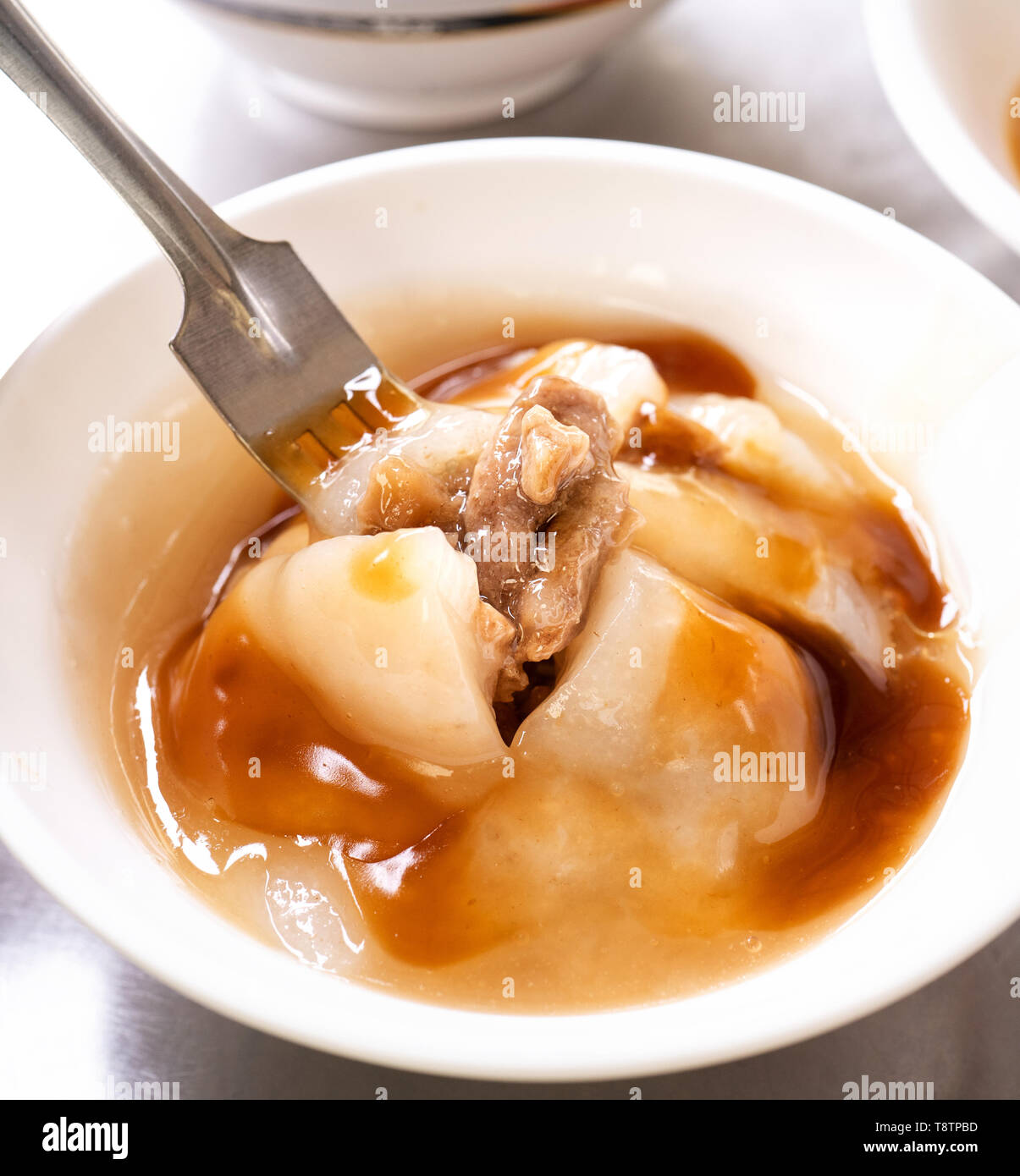 Bawan (Ba wan), taiwanese meatball delicacy, delicious street food, fried starch wrapped round shaped dumpling with pork inside, close up, copy space Stock Photo