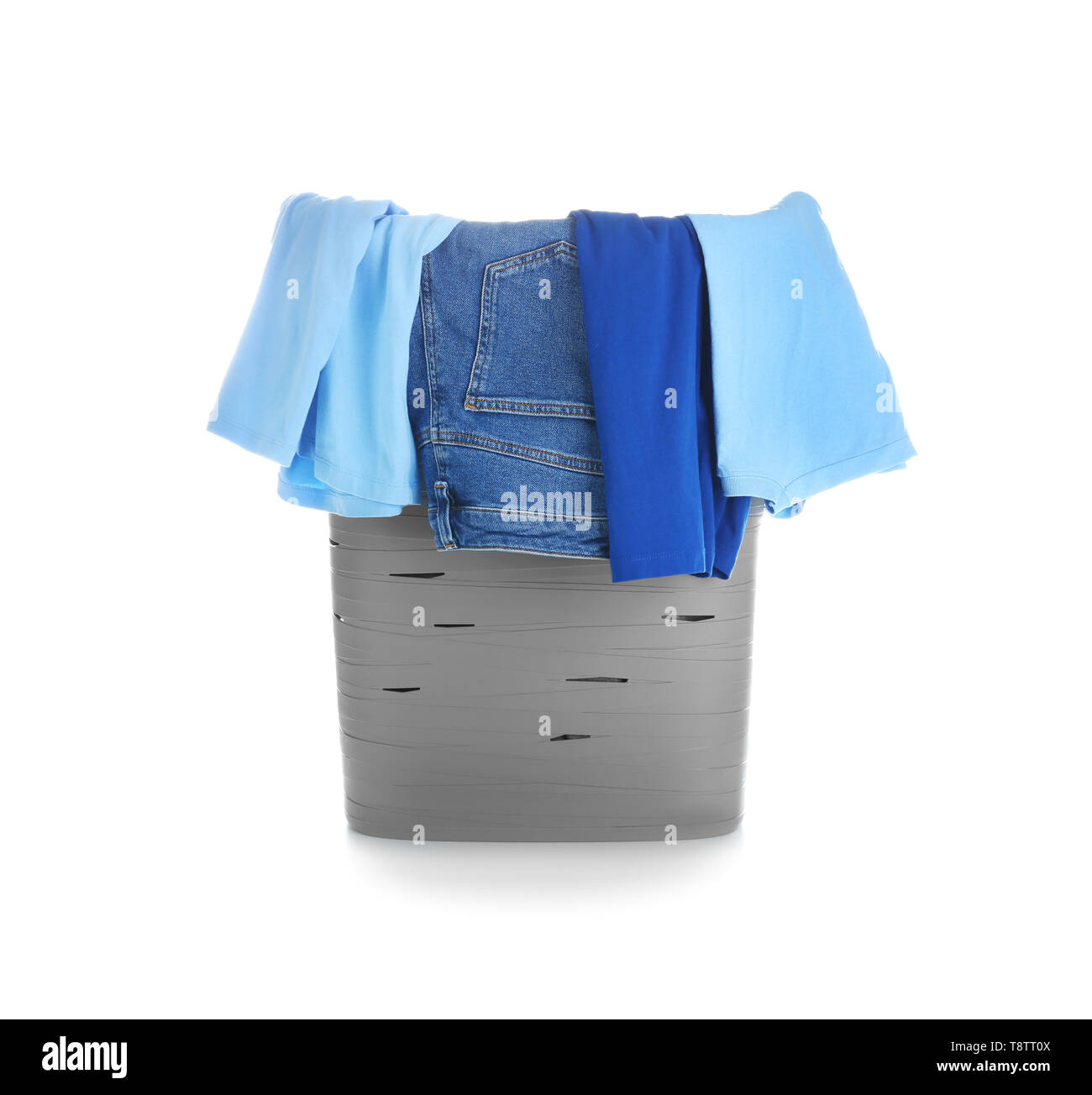 Laundry basket with dirty clothes on white background Stock Photo Alamy