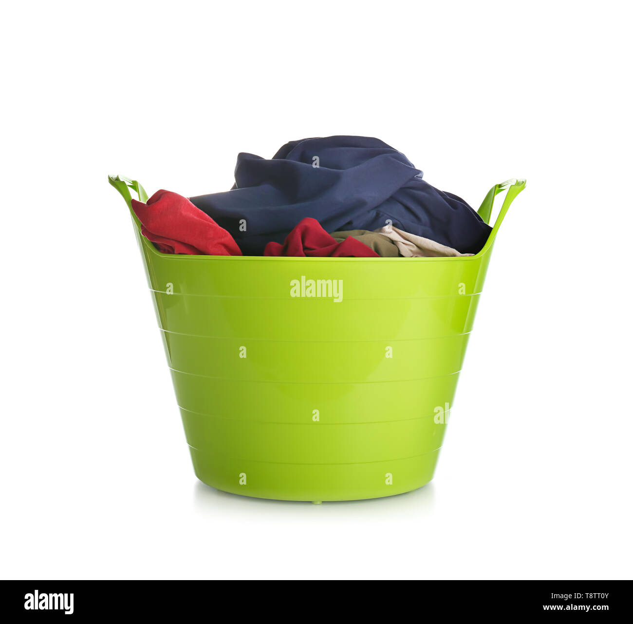 Laundry basket with dirty clothes on white background Stock Photo Alamy