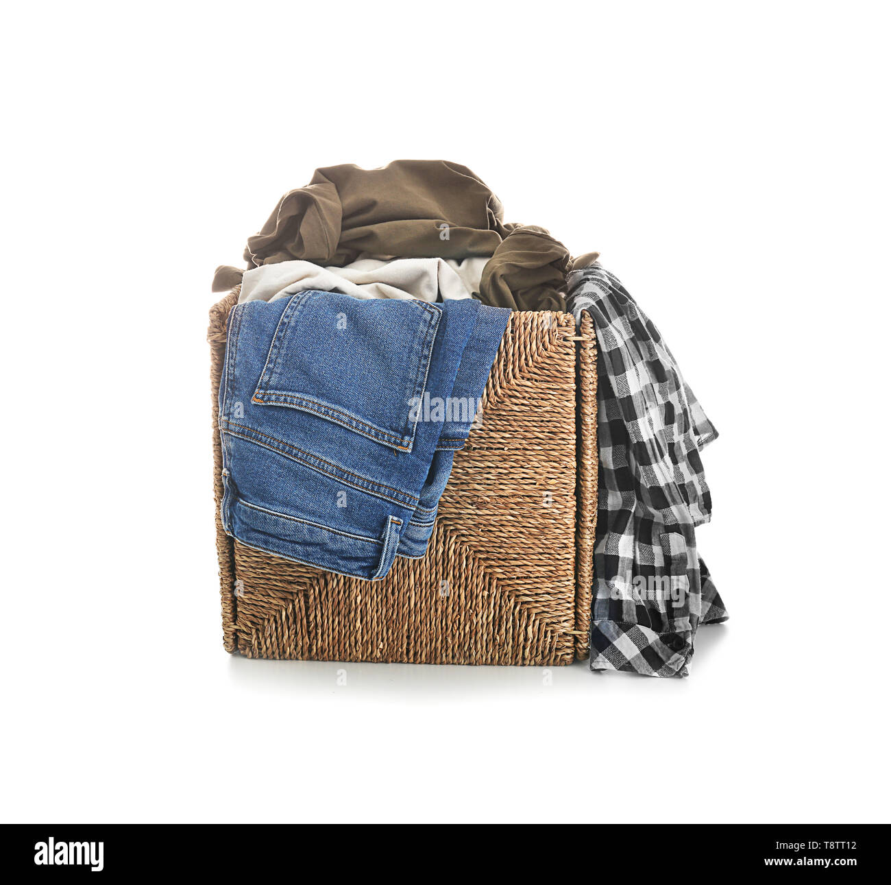 Laundry basket with dirty clothes on white background Stock Photo Alamy