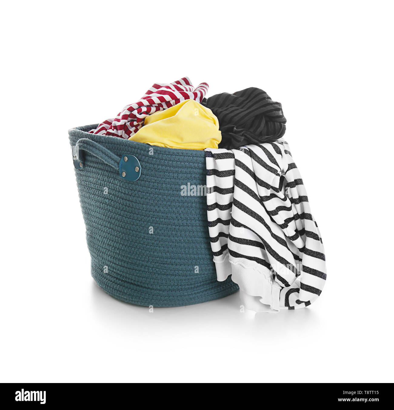 Laundry basket with dirty clothes on white background Stock Photo Alamy