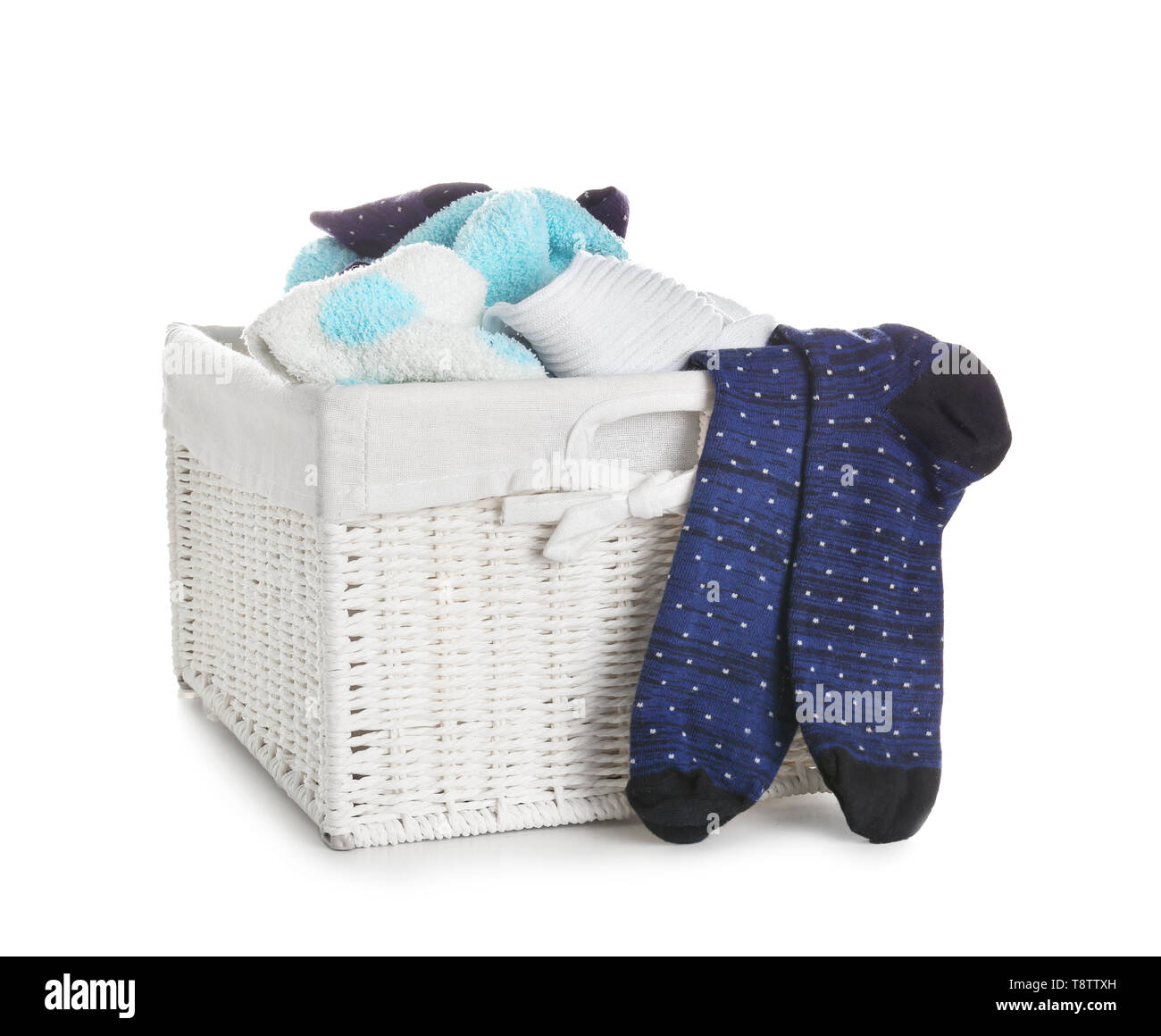 Laundry basket with dirty clothes on white background Stock Photo Alamy