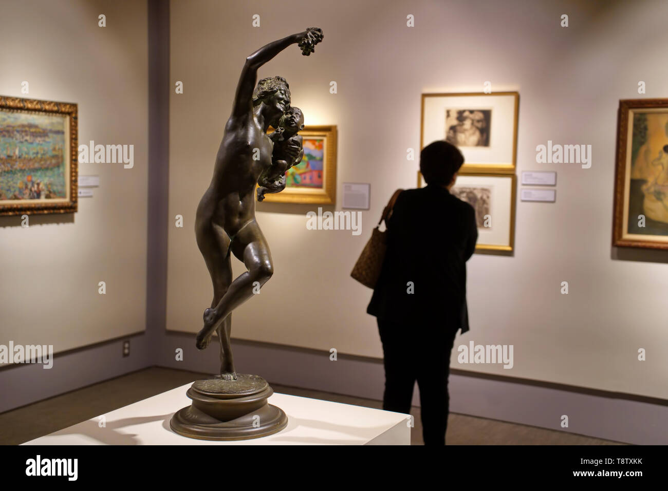 Storrs, CT USA. Oct 2018. Visitors admiring the many works of art at the William Benton Museum of Art on the campus of the University of Connecticut. Stock Photo