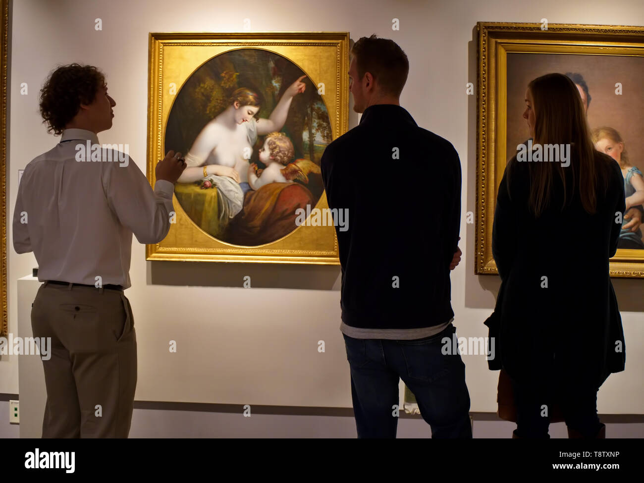 Storrs, CT USA. Oct 2018. Visitors admiring the many works of art at the William Benton Museum of Art on the campus of the University of Connecticut. Stock Photo