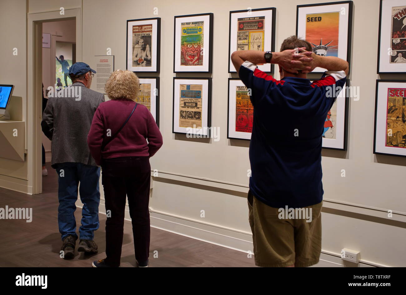 Storrs, CT USA. Oct 2018. Visitors admiring the many works of art at the William Benton Museum of Art on the campus of the University of Connecticut. Stock Photo