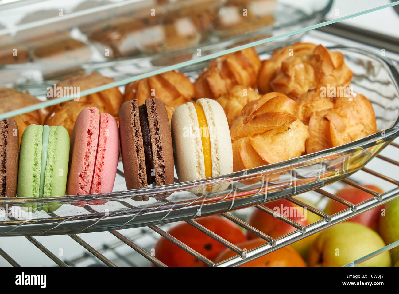 Showcase refrigerator for catering with cooked food. Sweet desserts, hot dishes and salads Stock