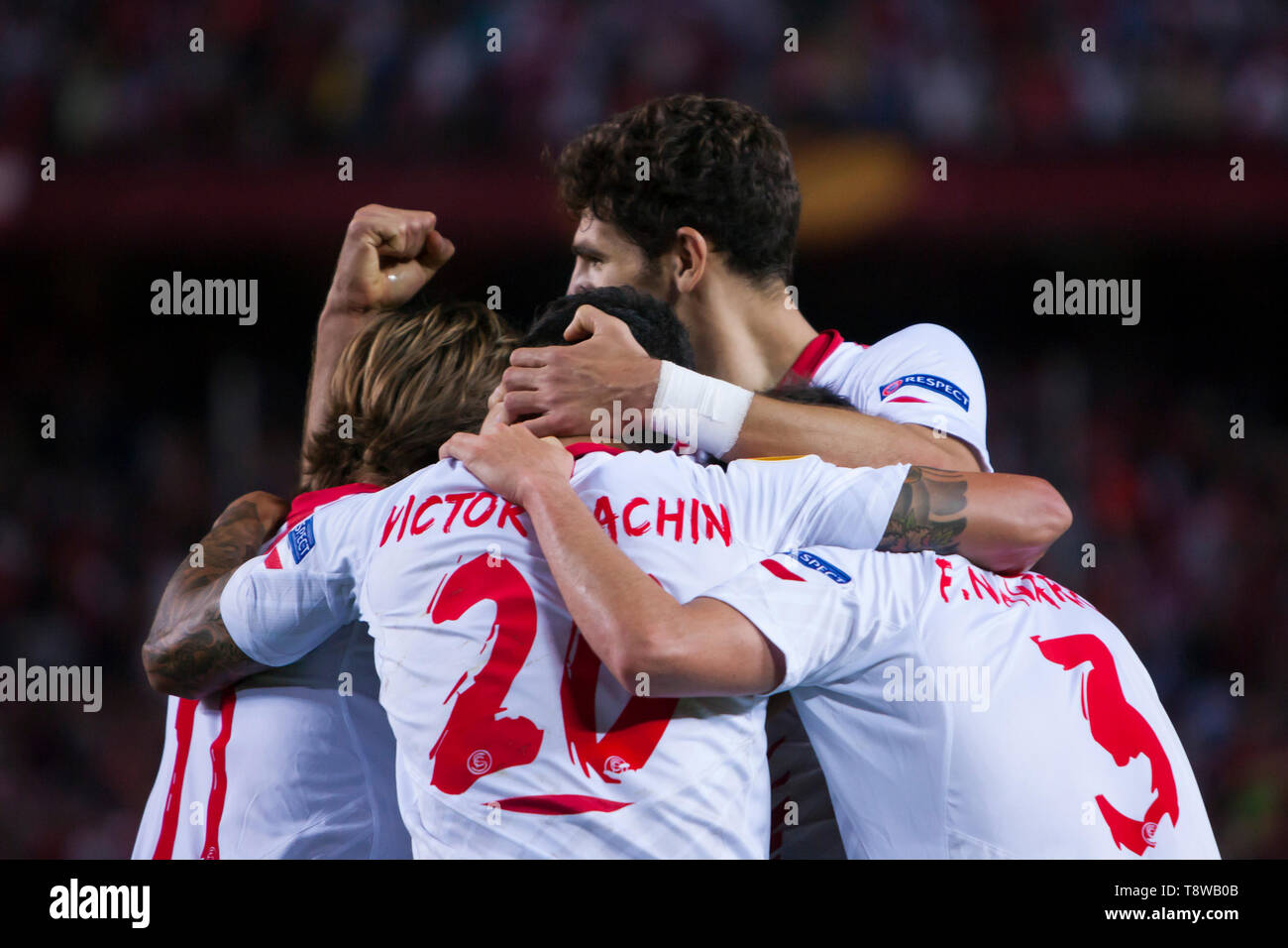 Players of Sevilla F.C. celebrate for 4-0 during the match of Europa League (quarterfinal 2nd leg) between Sevilla F.C. and F.C. Porto at the Ramon Sanchez Pizjuan Stadium on April 10, 2014 in Seville, Spain Stock Photo
