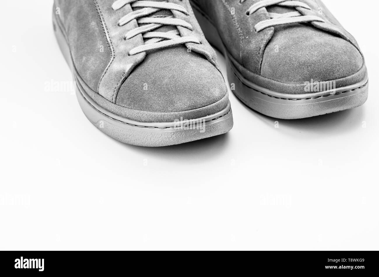 sneaker shoes on a blank surface with copy space Stock Photo
