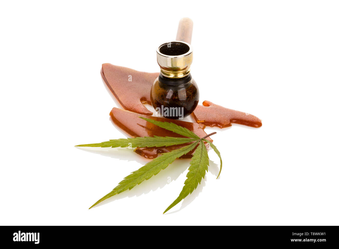 Glass Cannabis Pipe With Marijuana Leaf Over White Background High-Res  Stock Photo - Getty Images