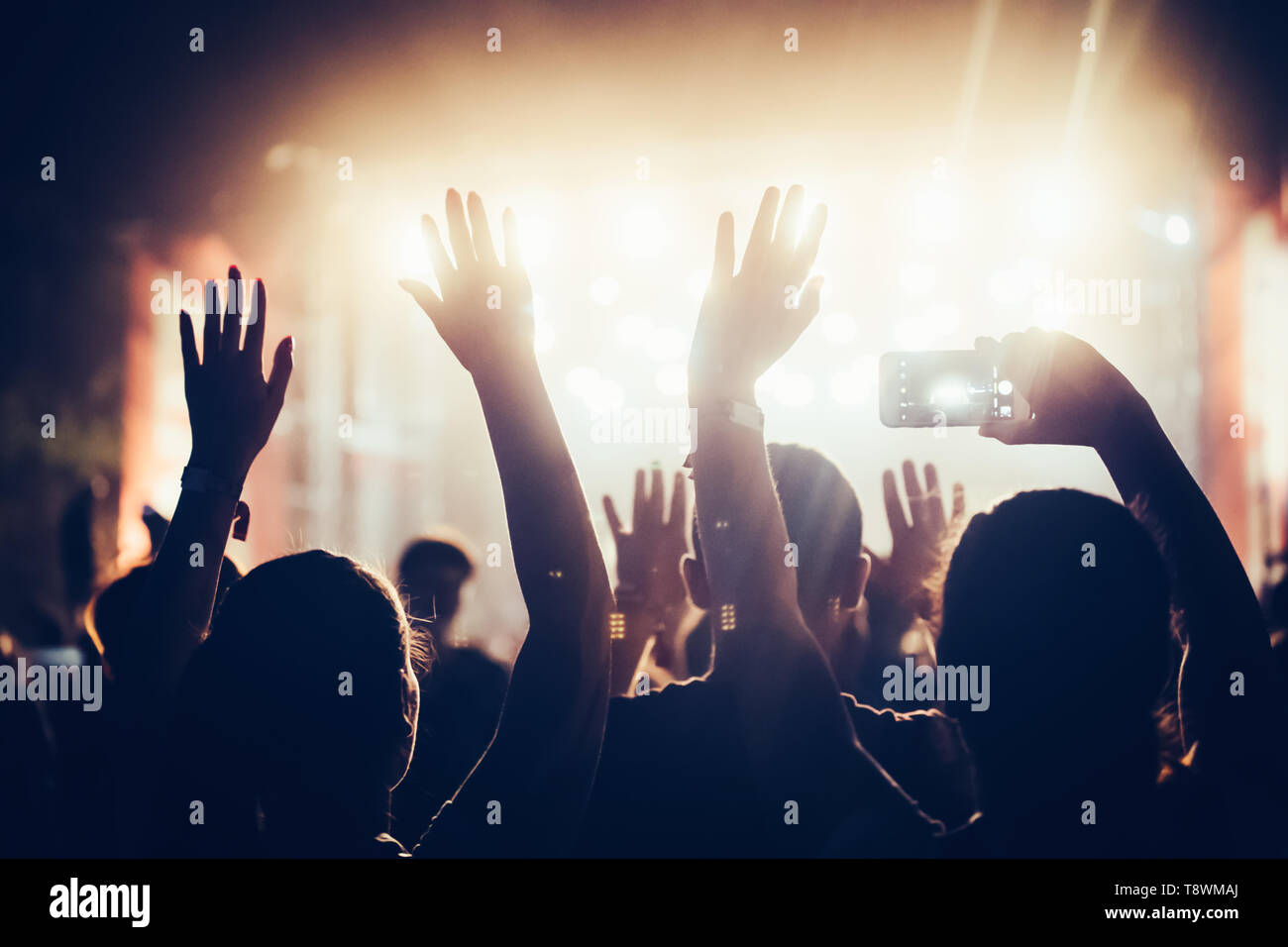 Nightclub crowd hands in the air hi-res stock photography and images ...
