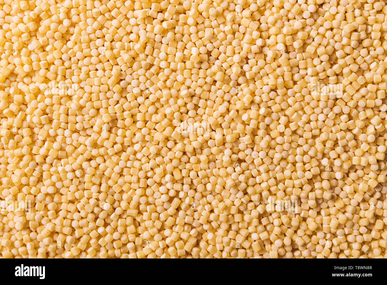 Pasta pellets as food background, top view Stock Photo