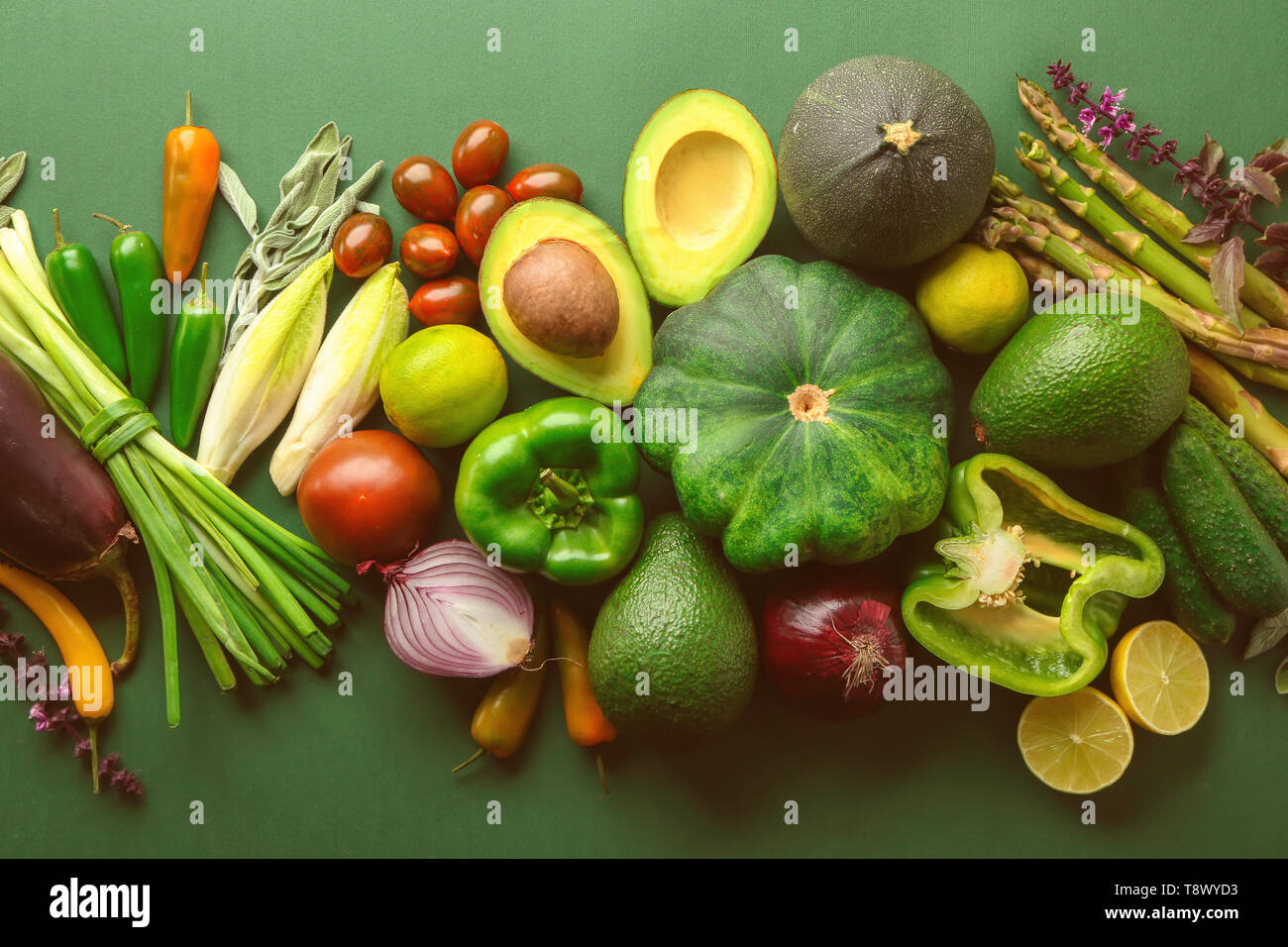 Various fresh vegetables on color background Stock Photo - Alamy