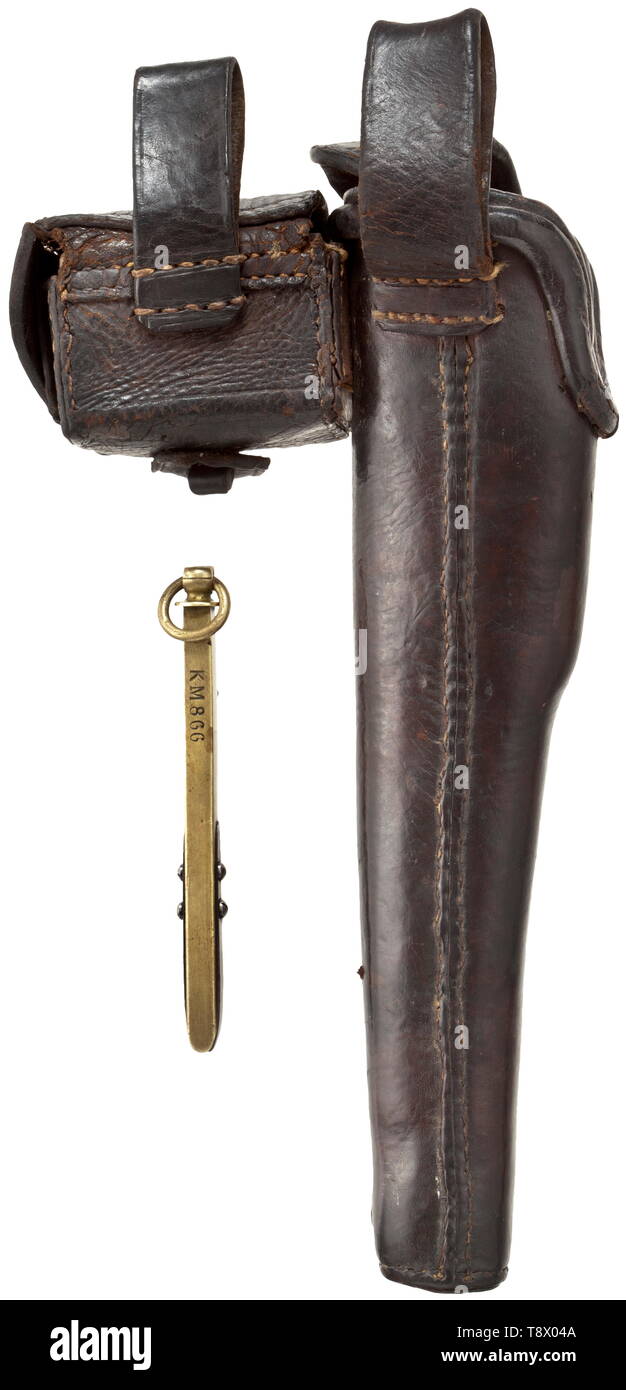 A German navy holster with accessory bags for an Adams M/69 Revolver from Schilling manufacture, Suhl Made from a Colt M/57 holster by extending it to 270 mm. Dark brown, strong cowhide with pouch for spare cylinder and front pocket for primer box. Closing strap and pouch for spare cylinder both with navy acceptance stamp crown/KM. Brass closing knob on holster, leather toggles on accessory bags. Stitches in good order. Very good overall condition. Additionally a brass primer box marked 'K M 866', blued steel mounts. Fully functional. Note: The A, Additional-Rights-Clearance-Info-Not-Available Stock Photo