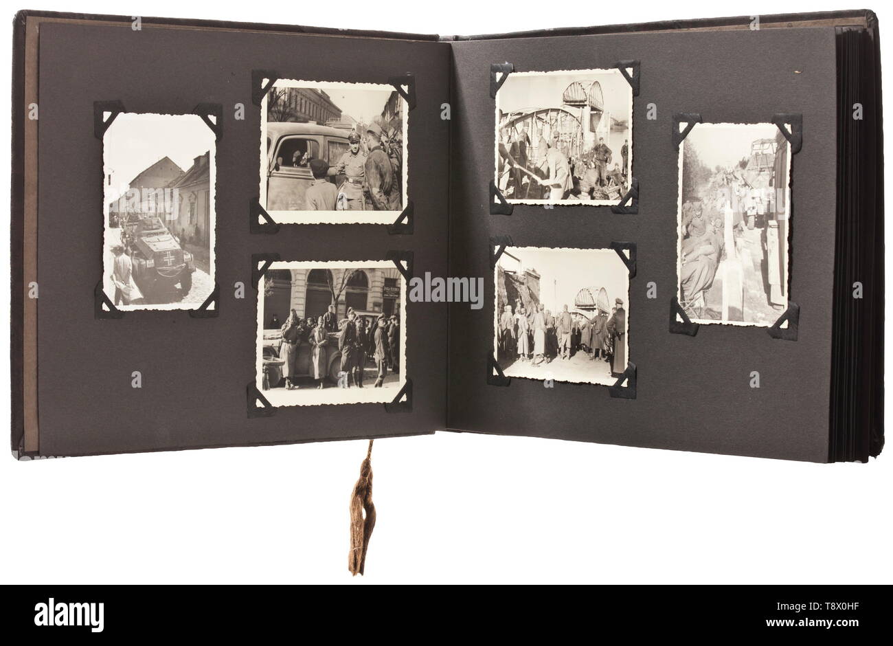 A photo album of Standartenführer Johannes Mühlenkamp - winner of the Oak Leaves to the Knight's Cross of the Iron Cross - Division 'Wiking' Album with 93 photos of various sizes, re-fastened with photo corners. Depicting technical gear and vehicles, buildings and villages, SS parade in the East, military equipment, tanks and motorcycles, regiments and many other scenes. Johannes Mühlenkamp was commander of the 5th SS Panzer Division and received the Oak Leaves to the Knight's Cross of the Iron Cross on 21 September 1944. historic, historical, 20th century, 1930s, 1940s, Wa, Editorial-Use-Only Stock Photo