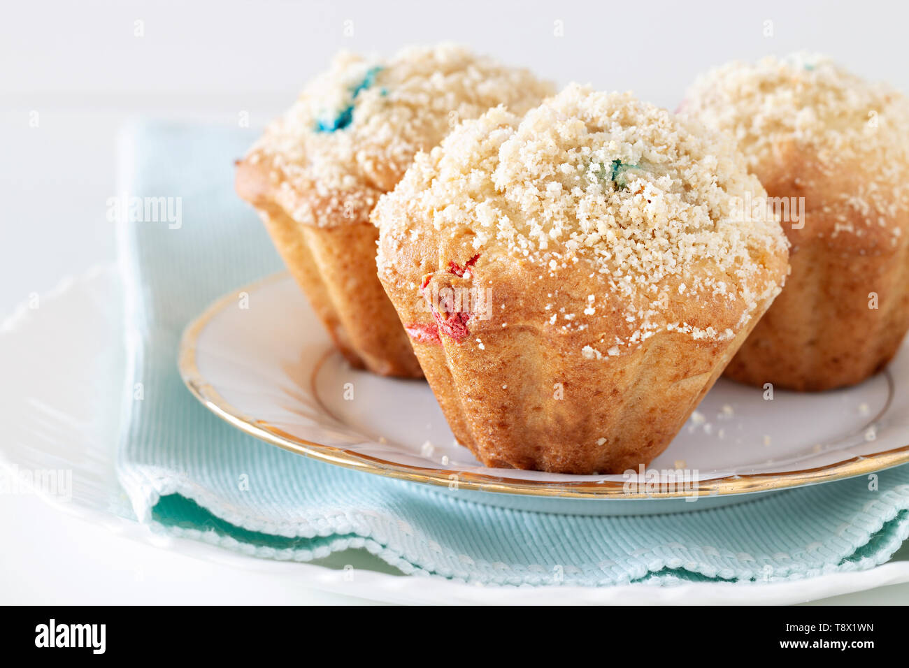 Healthy Apple Oats streusel Muffins on white plate. Selective focus. Copy space. Stock Photo
