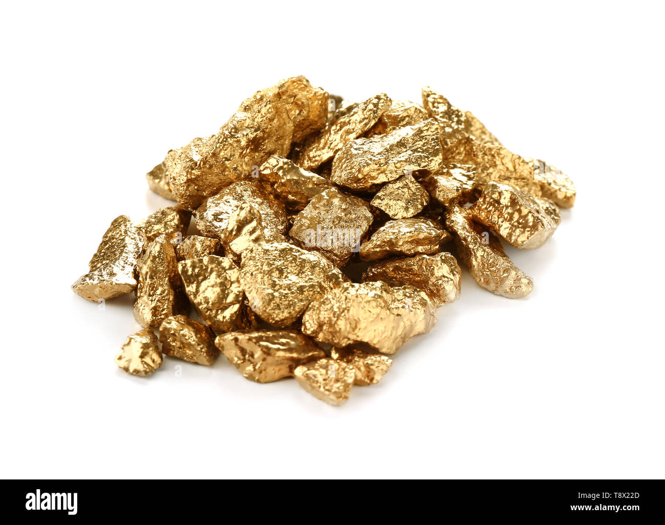 Gold nuggets on white background Stock Photo - Alamy