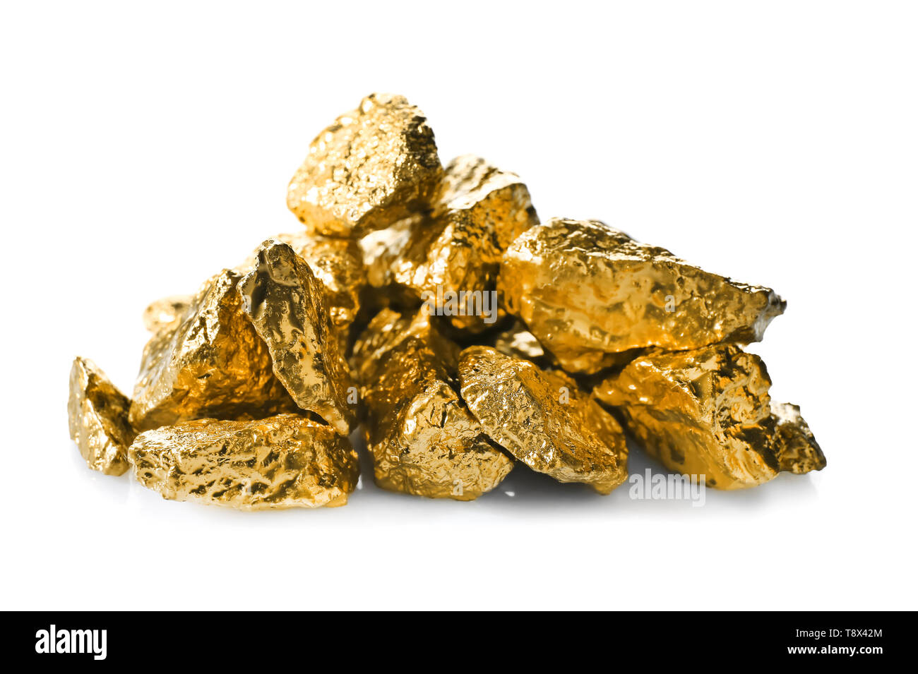Gold nuggets on white background Stock Photo - Alamy