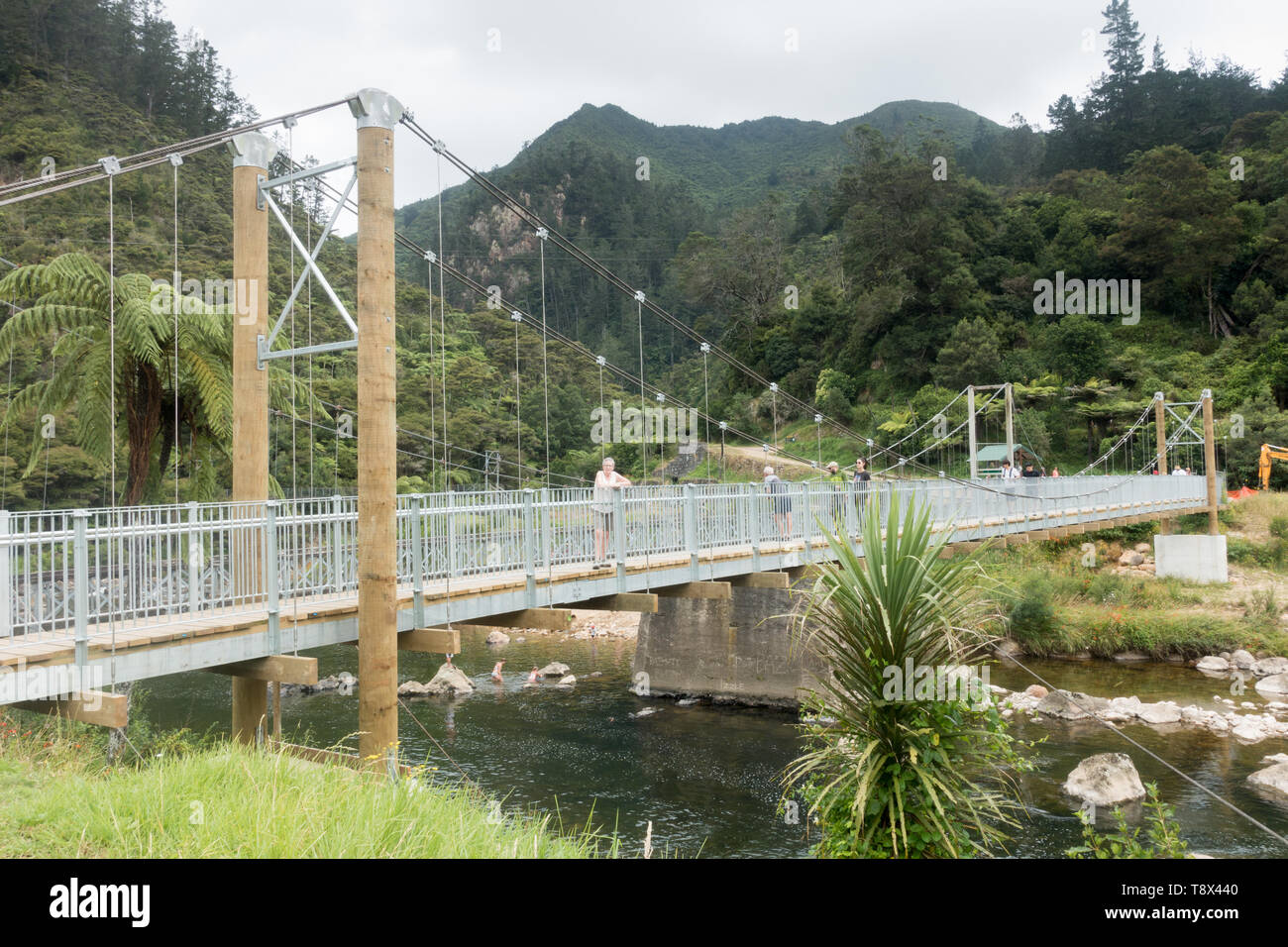 A walking and cycling track on the old railway line in the Karangahake Gorge, part of the Hauraki Rail Trail Stock Photo