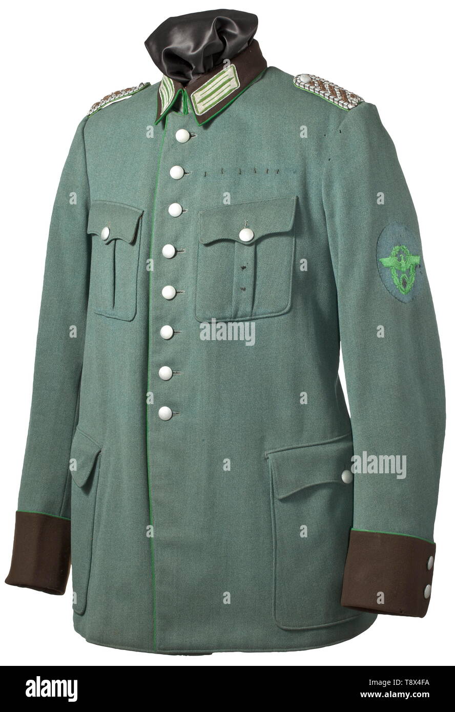 A tunic for a Meister (senior NCO) of the Reich Protection Police depot piece from 1939 Police-green gabardine, collar and cuffs of brown badge cloth, light green piping, brown liner with depot stamping. Complete with all insignia. Moth traces. Large sized. historic, historical, 20th century, Additional-Rights-Clearance-Info-Not-Available Stock Photo