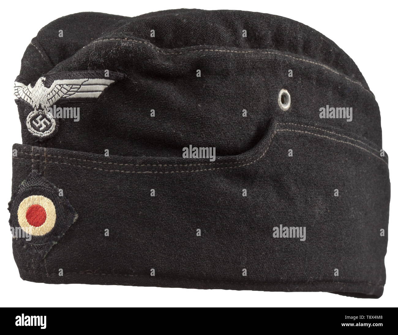 A garrison cap M 38 'Schiffchen' for enlisted men/NCOs of panzer troops special black clothing issue Depot piece of black woollen cloth, zinc ventilation rivets, khaki-coloured inner liner, BeVo insignia on a black ground. Signs of usage and age. historic, historical, army, armies, armed forces, military, militaria, object, objects, stills, clipping, clippings, cut out, cut-out, cut-outs, 20th century, Editorial-Use-Only Stock Photo