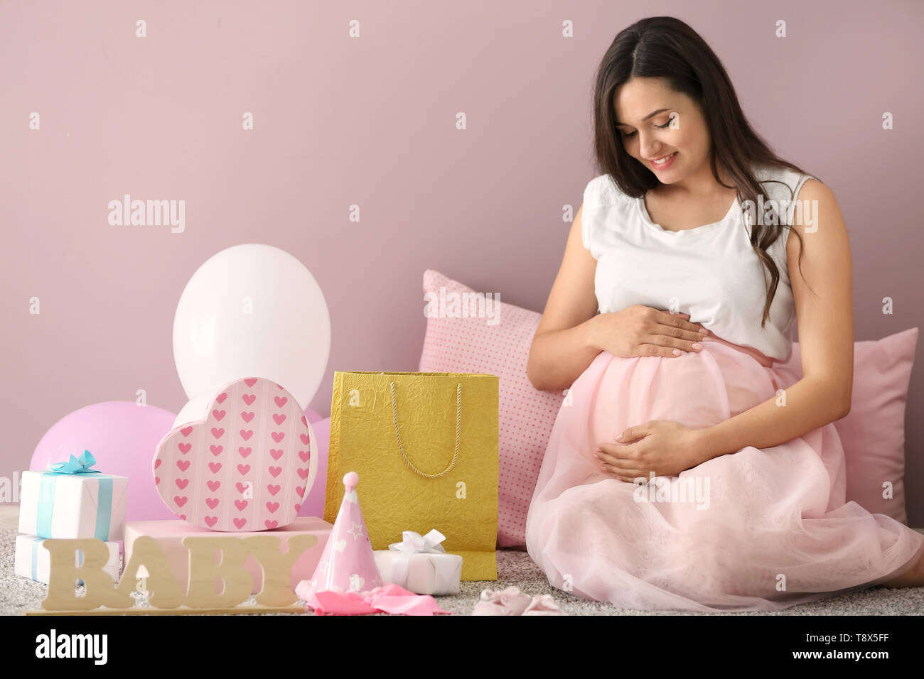 Beautiful Pregnant Woman With Baby Shower Gifts At Home Stock Photo Beautiful Pregnant Woman With Baby Shower Gifts At Home Stock Photo